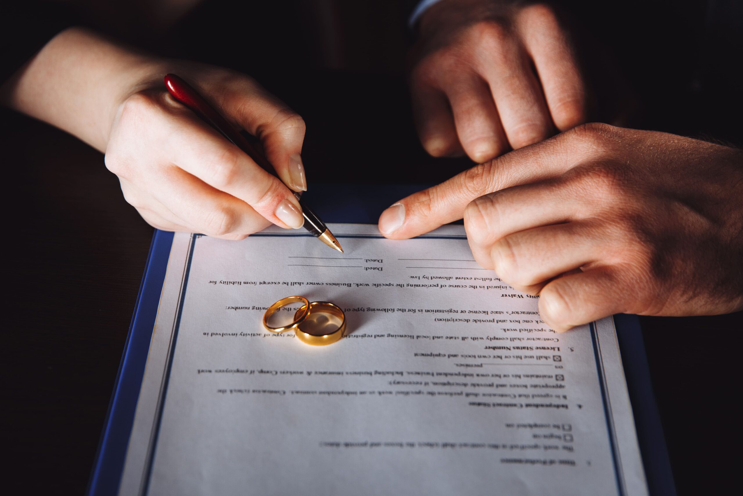 marriage-contract-sign-concept-man-woman-signing-documents